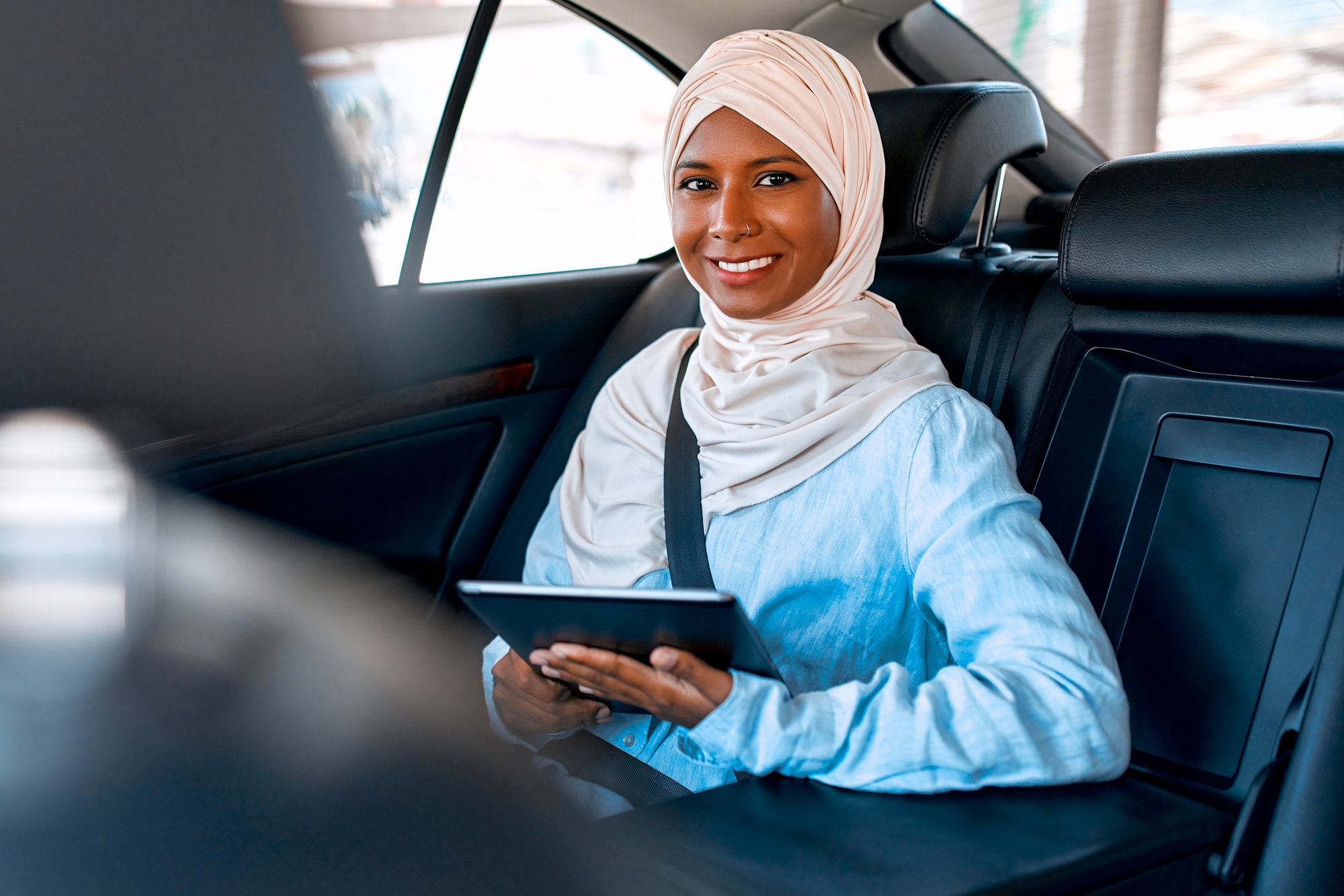 Muslim woman in the car